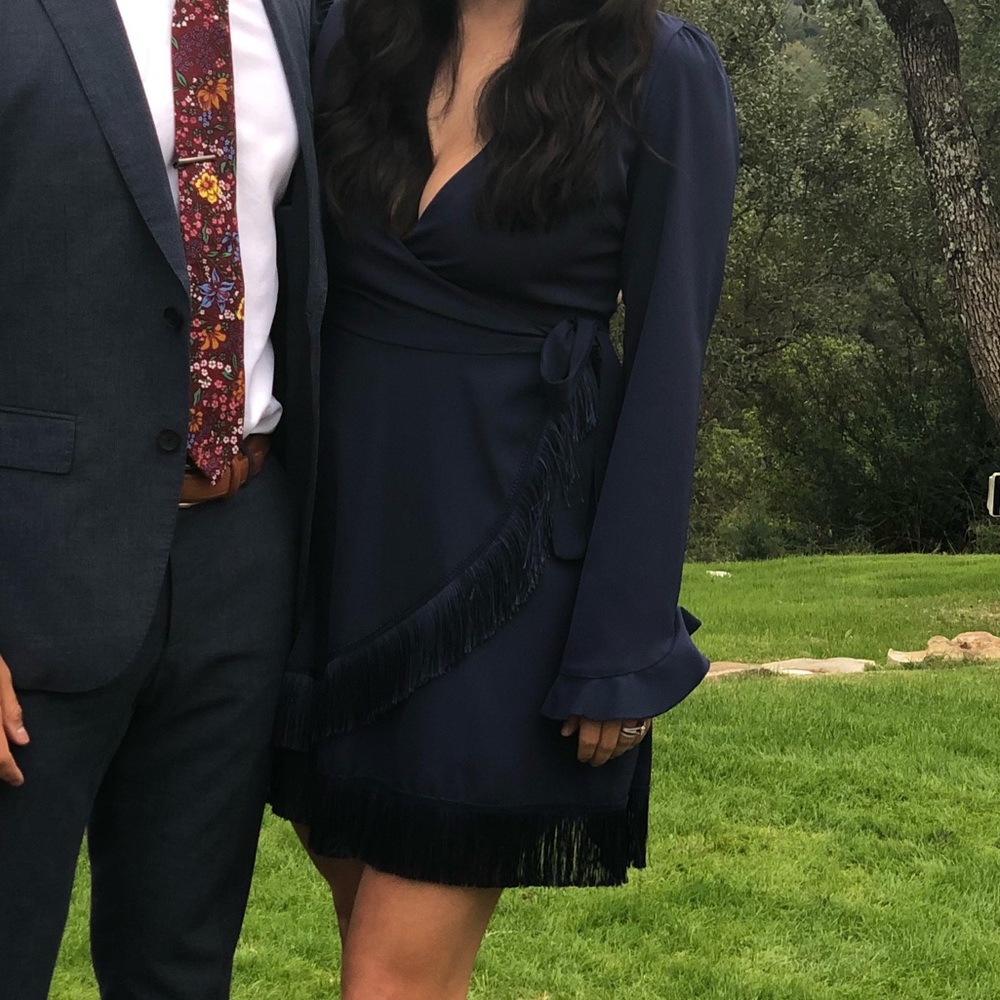 Wrap dress with fringe detail